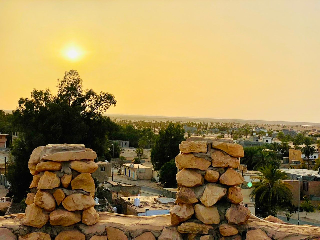 Sunset over Waddan viewed from the stone walls of the castle.